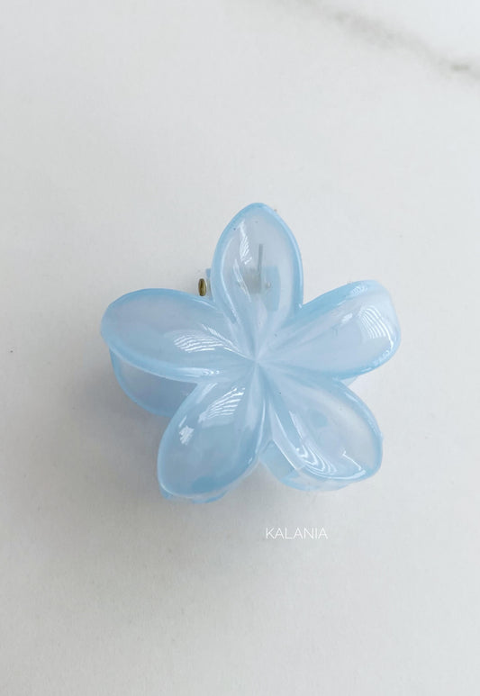 HAIR CLIPS FLORES HAWAIANA CELESTE TRANSPARENTE