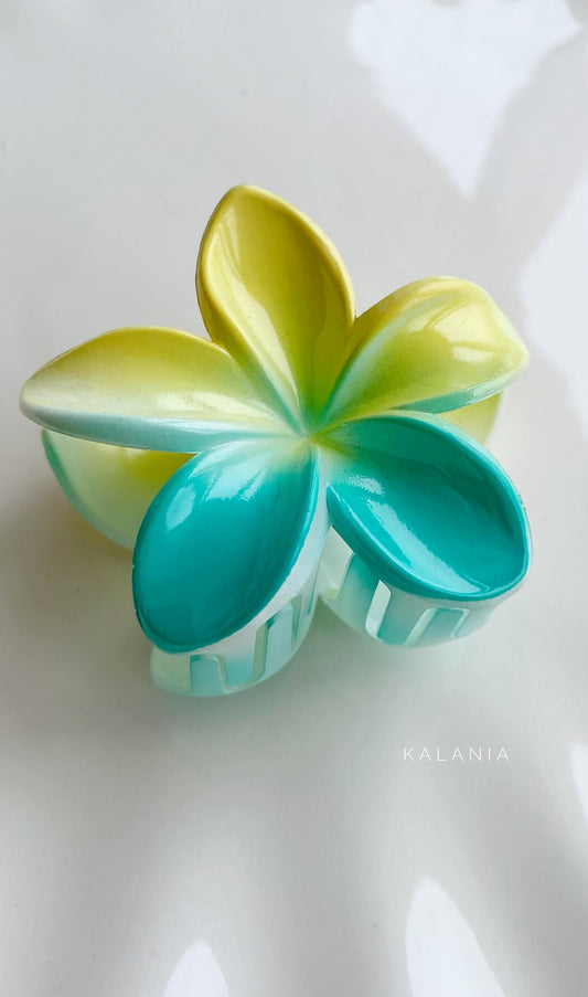 HAIR CLIPS FLORES HAWAIANA AMARILLO CELESTE MEDIANA